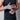 Athlete wearing black athletic wear with patterned Xpeed hand wraps on a neutral background