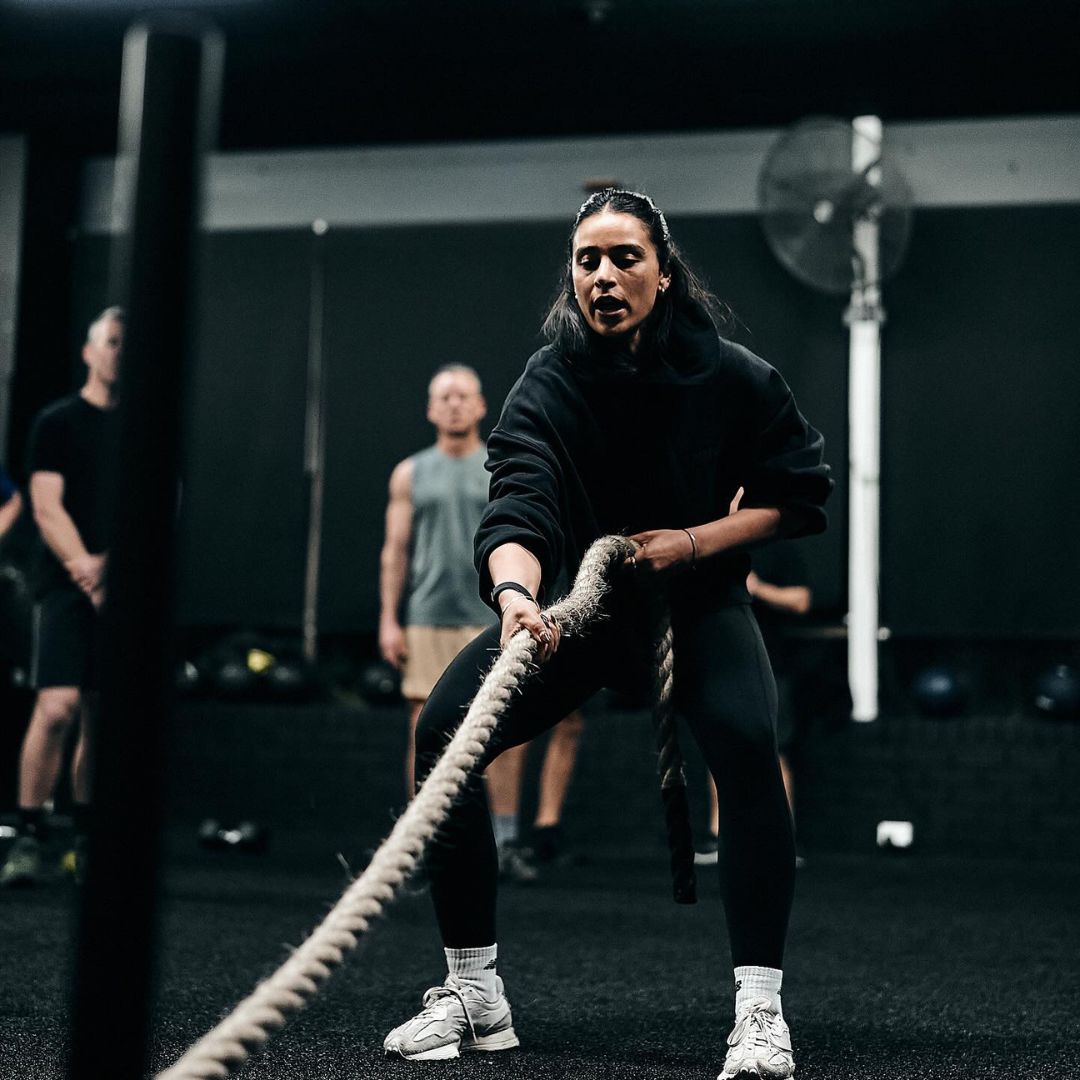 A female athlete training with an Xpeed climbing rope