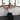 PVC Dumbbells being used in a n exercise by a female pilates instructor