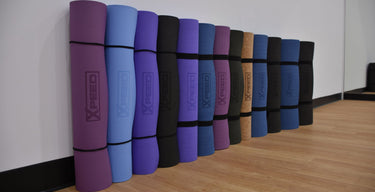 a collection of Xpeed Fitness mats