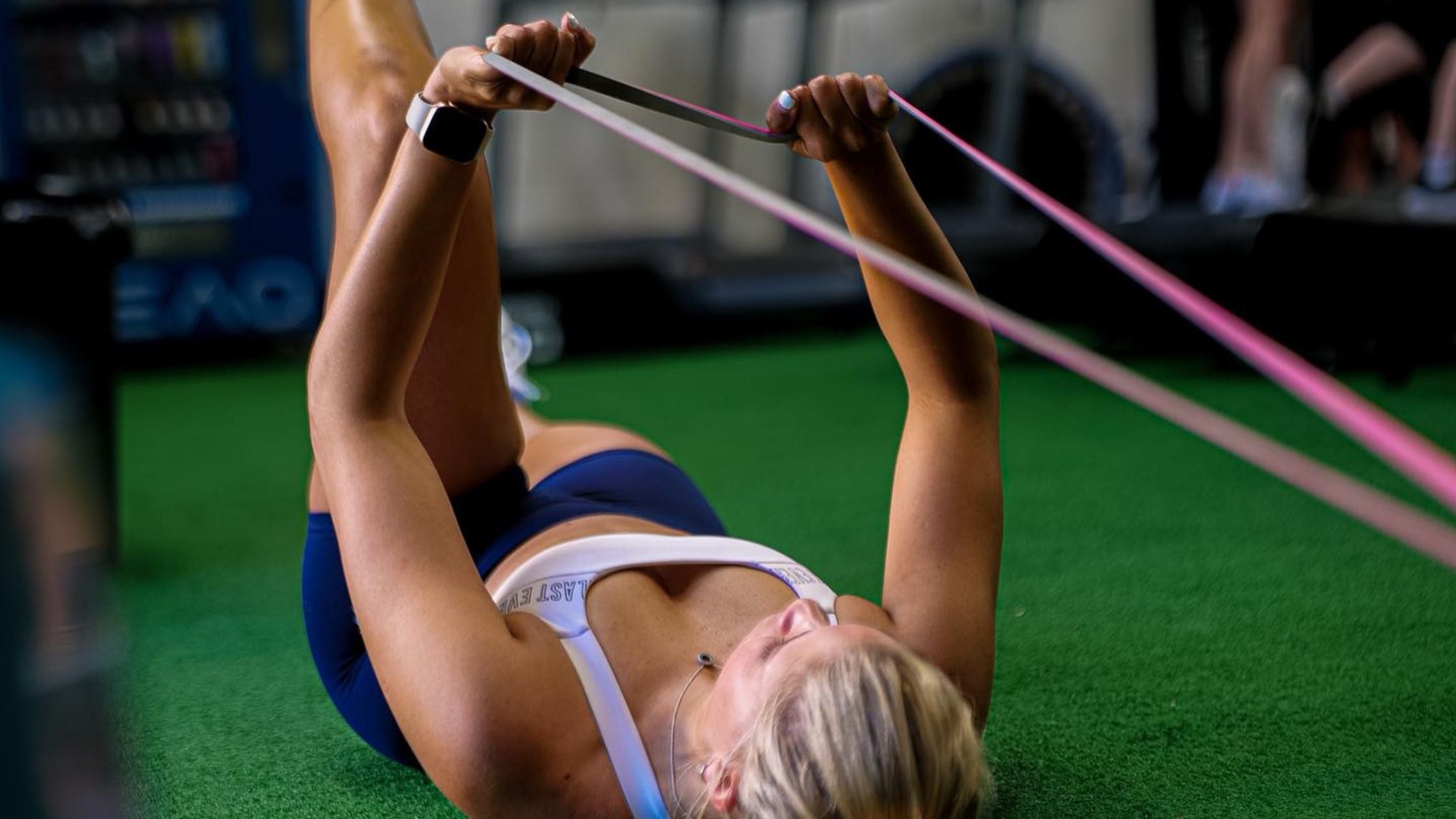 Woman using xpeed power band to train core stability