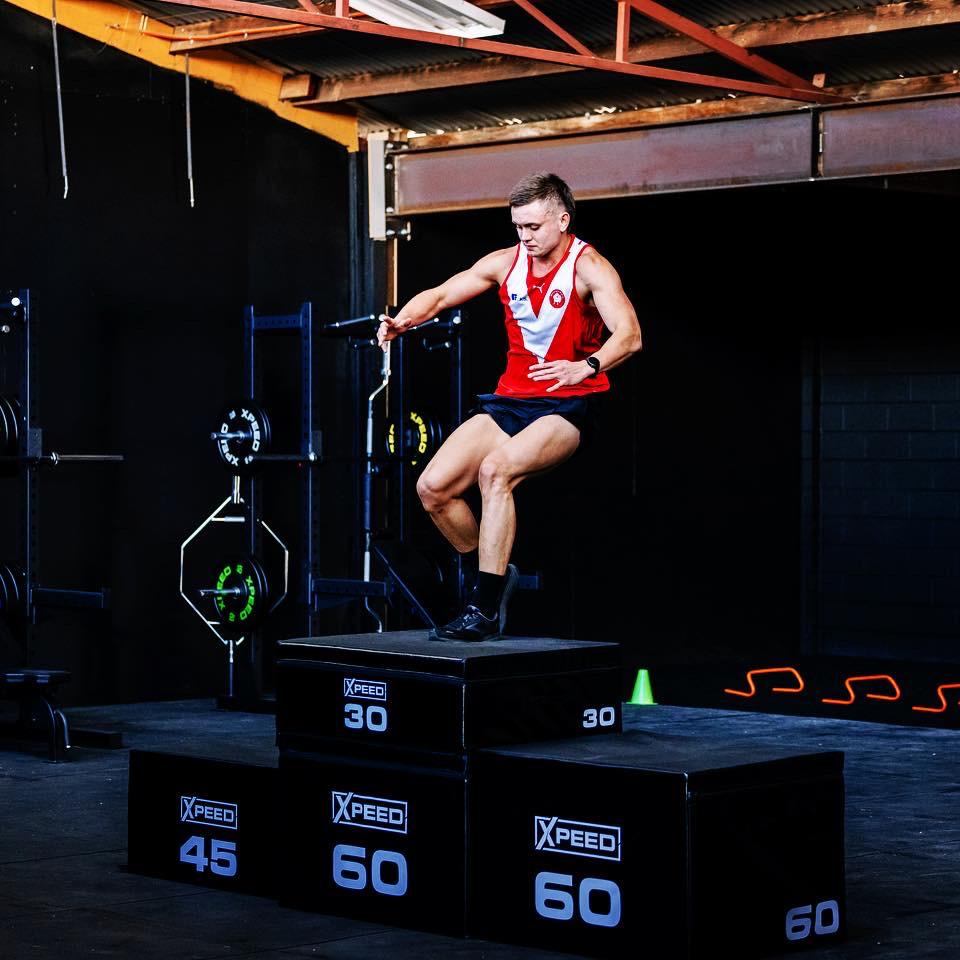 Athlete explosively training on an xpeed stackable soft plyo box