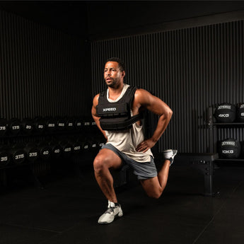 Male athelte using the Xpeed weight vest for bulgraian split squats