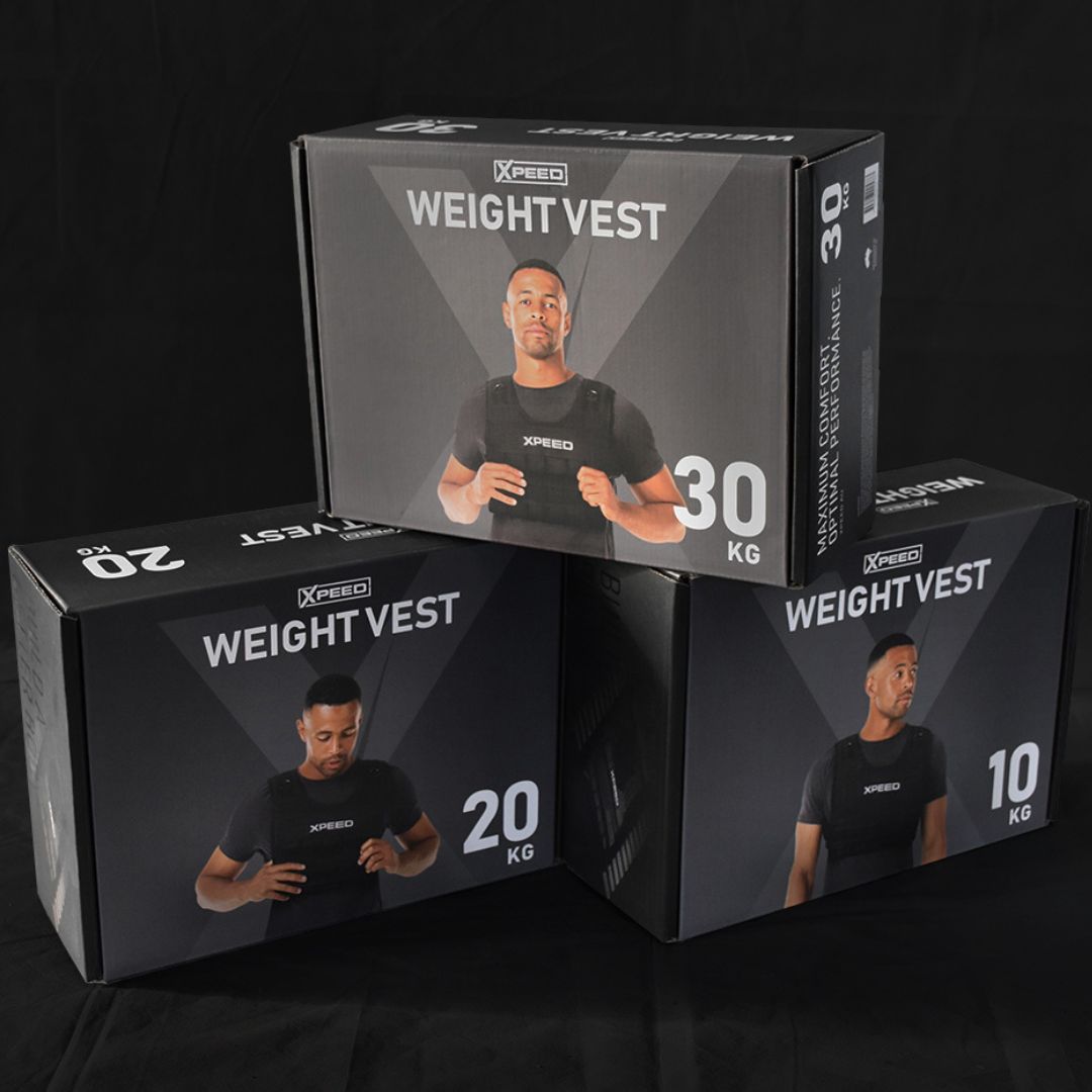 3 Xpeed weight vests stacked together in their boxes