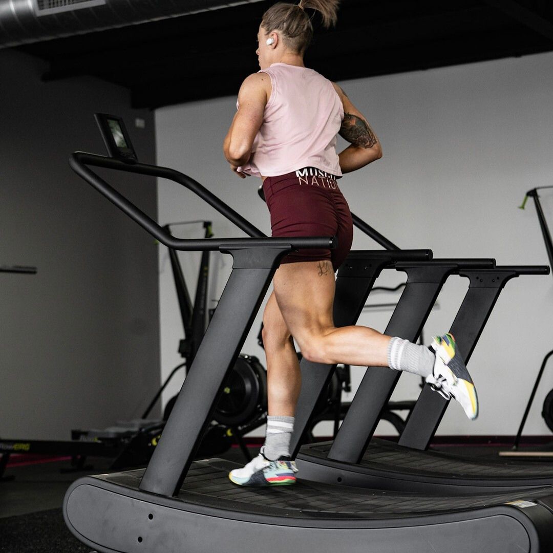 A female athlete performing on the Xpeed Velocity Runner - Sprint Treadmill in Vibe Morphetvale